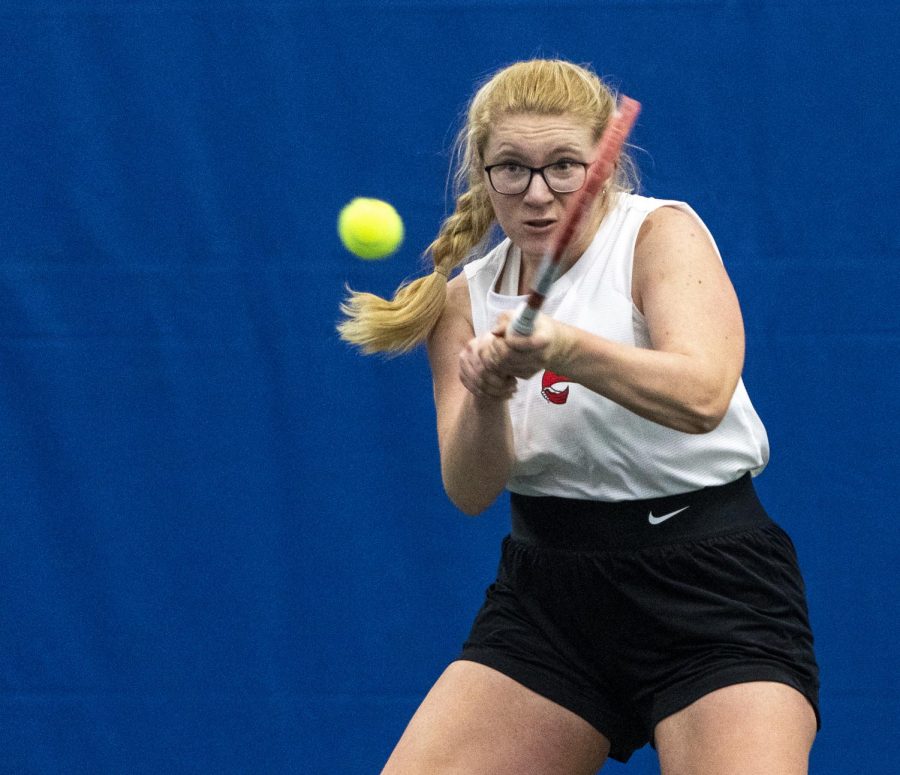 WKU junior Cora-Lynn Von Dungern volleys the ball back to a Lipscomb tennis player during the tennis match against Lipscomb University at the Michael O. Buchanon tennis facility on Jan. 30, 2022. The Hilltoppers won 4-3, starting off their season off with 2 wins and 0 losses.