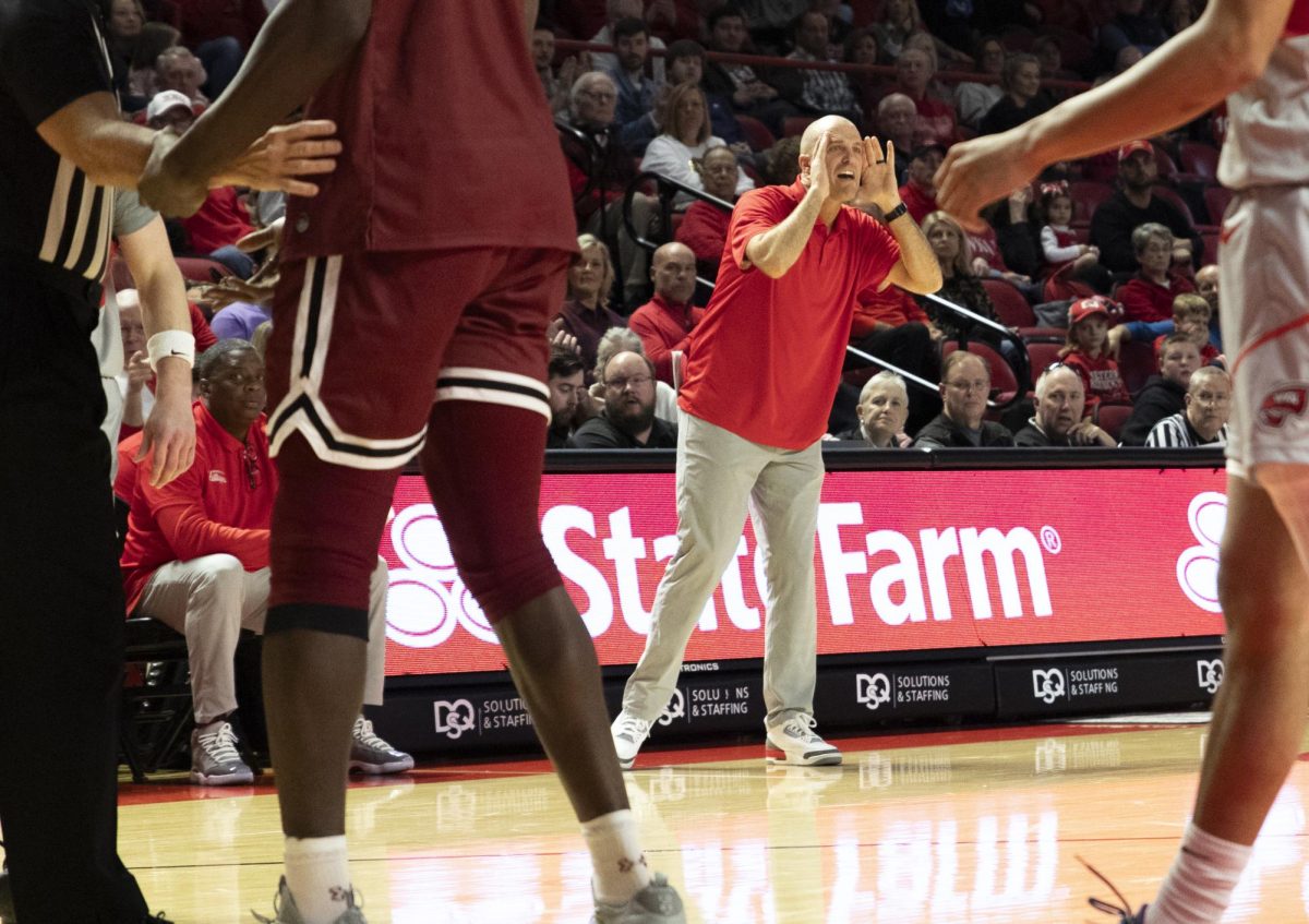WKU head coach Steve Lutz yells out to his players during a game against NMSU held in the Diddle Arena on Feb. 17.