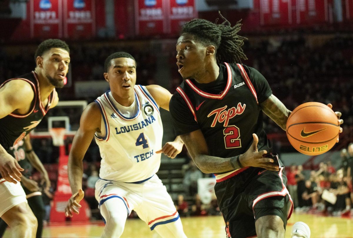 Guard Don McHenry (2) drive the lane during WKU's game against LA Tech on Wednesday, Feb. 28, 2024.
