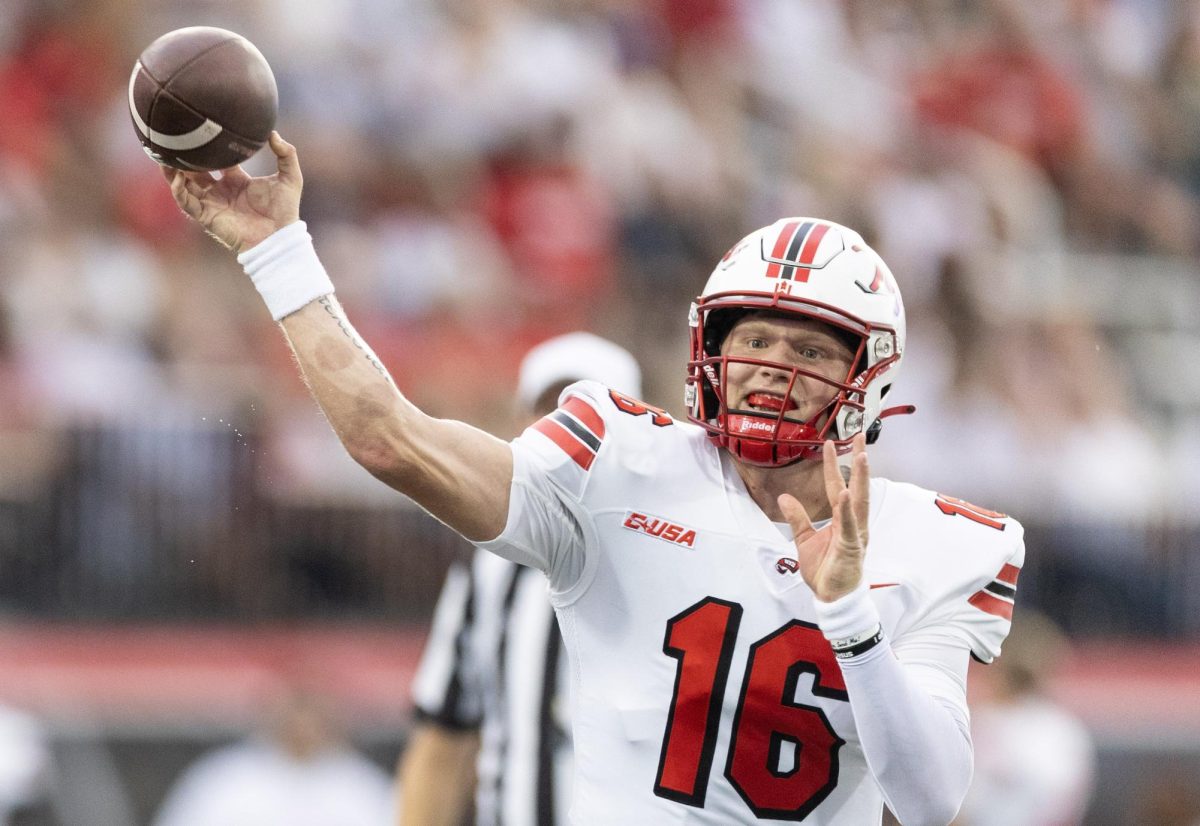 Redshirt senior quarterback Austin Reed throws the ball during WKU’s game against Houston Christian on Saturday, Sept. 9, 2023. WKU won 52-22.