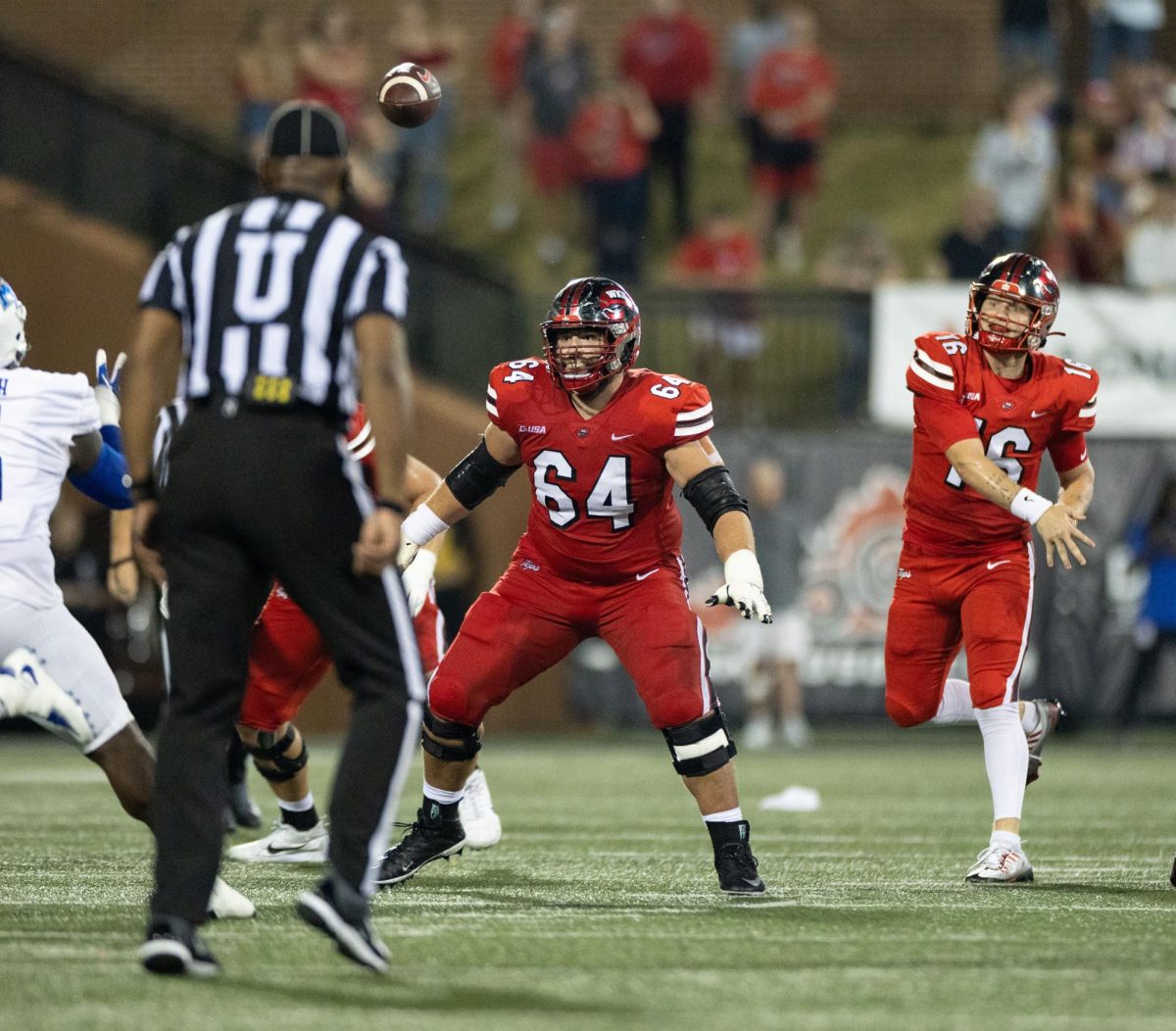 Quarterback Austin Reed throws a pass during a game against Middle Tennesee State University at L.T Smith Stadium in Bowling Green on Thursday, Sept. 28, 2023. 