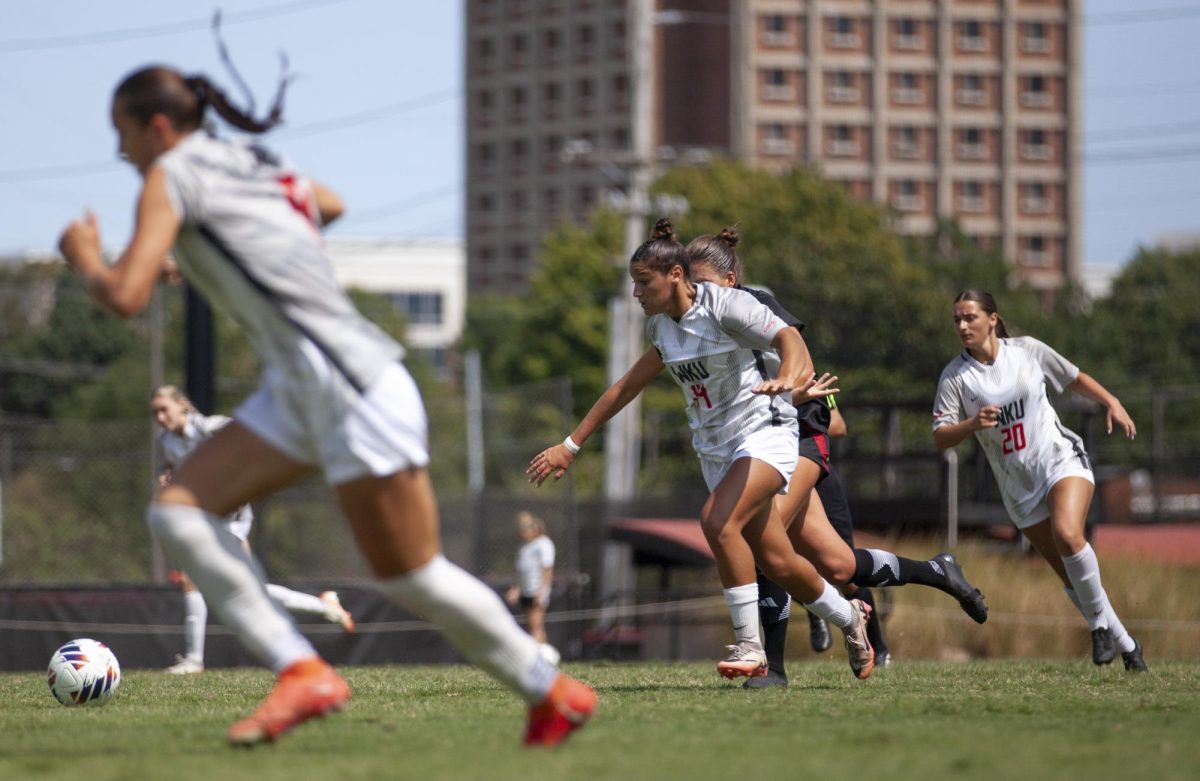 Western Kentucky University midfielder Alyvia Walls runs towards the ball during a game against Arkansas State University at the WKU Soccer Complex on Sunday, Sept. 8, 2024. 