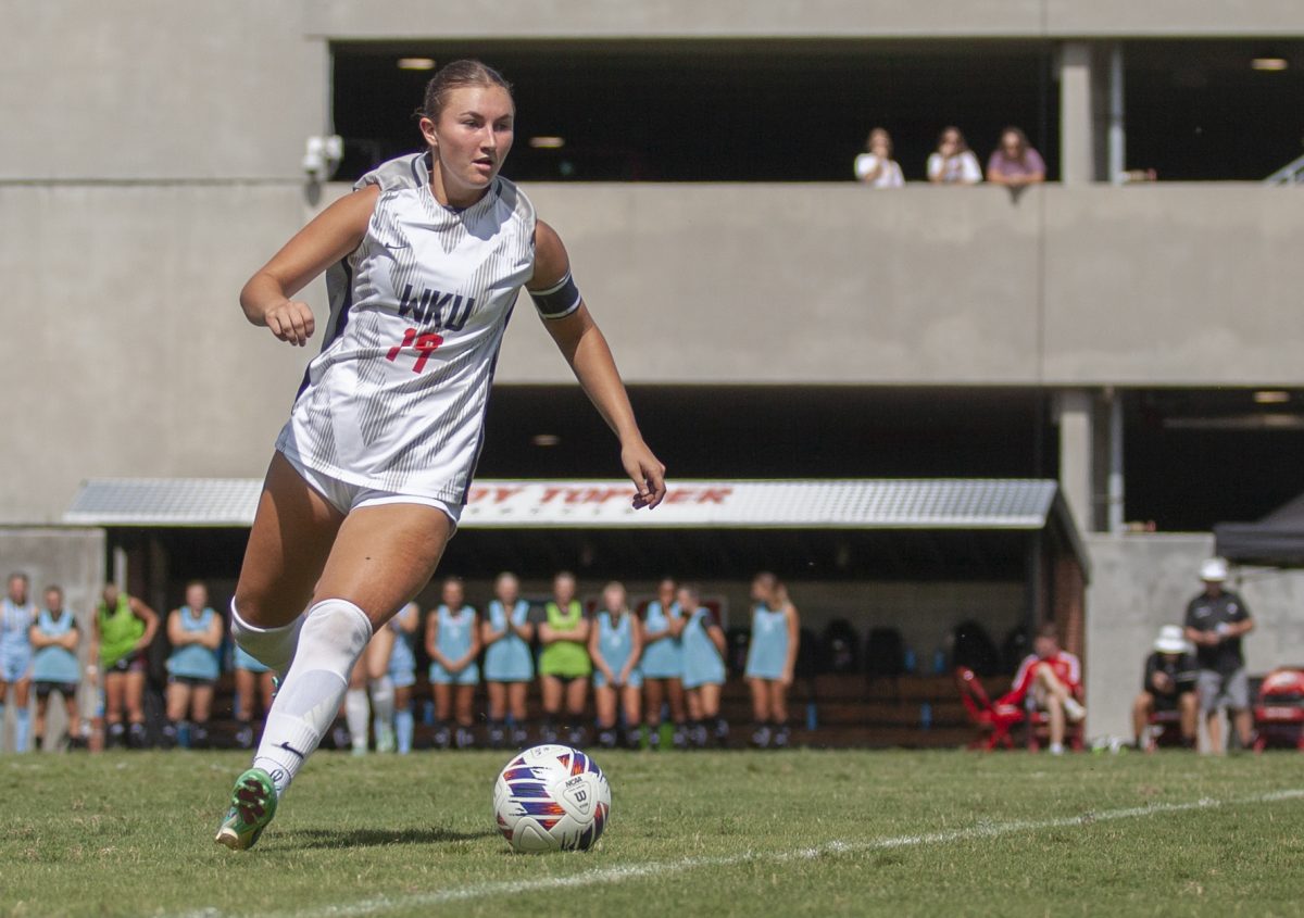 Western Kentucky University midfielder Rebecca Roth (19) brings the ball upfield during a game against Arkansas State University at the WKU Soccer Complex on Sunday, Sept. 8, 2024.