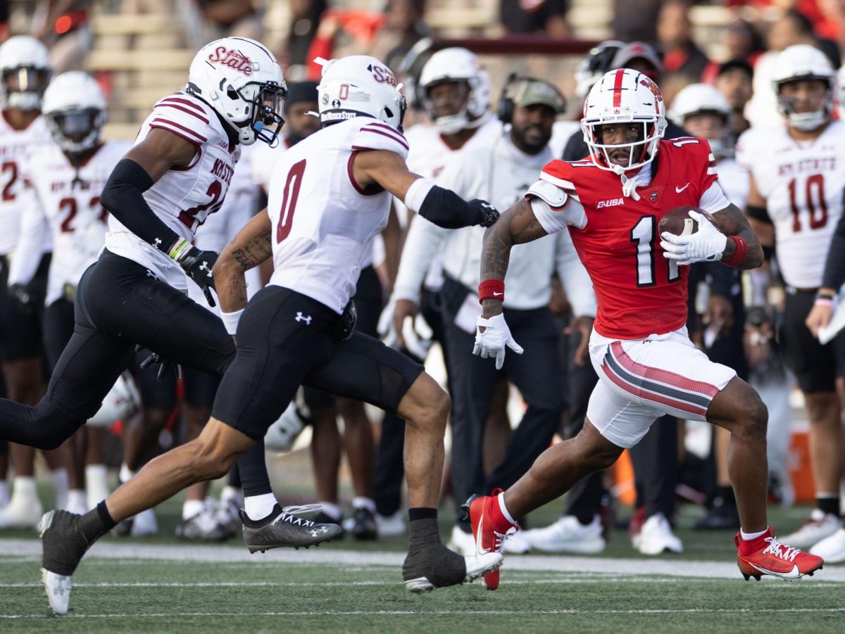 Wide receiver Malachi Corley (11) runs the ball downfield after a reception during the homecoming game against New Mexico State University at at L.T Smith Stadium in Bowling Green on Saturday, Nov. 11, 2023.