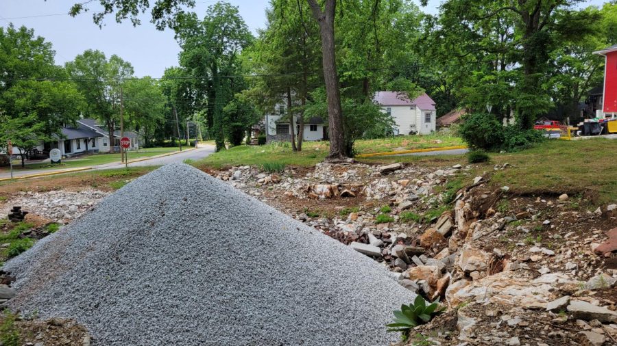 The basement of a WKU property on Chestnut Street next to Kiss Me Quick Avenue, previously unfilled, filled in with gravel.