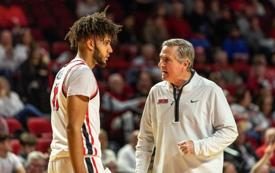 WKU men’s basketball head coach Rick Stansbury talks with guard /forward Dontaie Allen during the WKU v MTSU game at Diddle Arena in Bowling Green, Ky. on Feb. 9, 2023. WKU won 93-89.