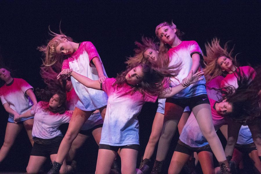 WKU's Omega Phi Alpha sorority sisters dance to a choreographed American tribute during the 25th annual Shenanigans event.