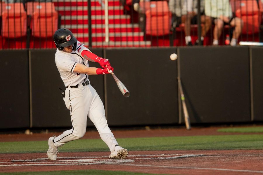 Hilltopper Baseball’s Ty Crittenberger (22) takes a cut at the ball from the Louisville Cardinal’s pitcher during their match up with the University of Louisville Cardinals on March 29th at Nick Denes Field.