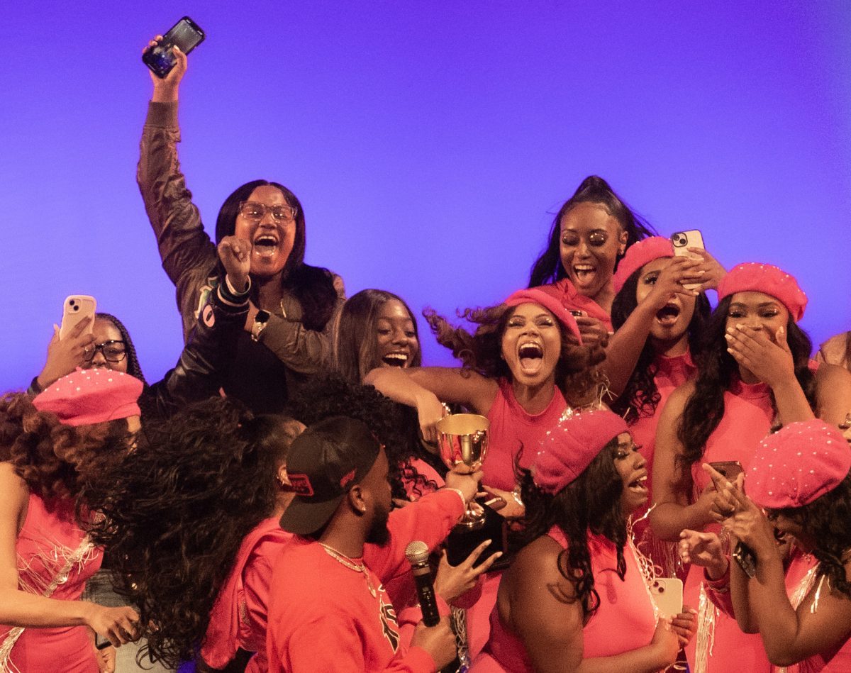 Performers with Alpha Kappa Alpha cheer upon hearing about their win at the 2023 Homecoming Step Show on November 10, 2023.