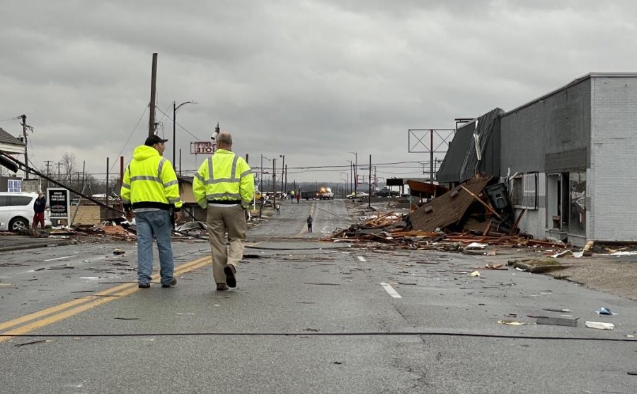 Crews walk along the closed off section of US 31 bypass on Dec. 11.