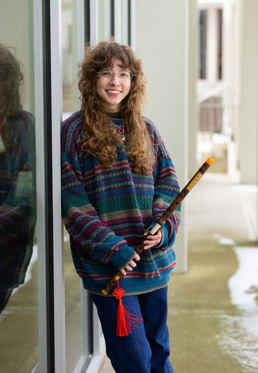 Chinese Music Club member and junior Gigi Lamb joined the club her second semester of her freshman year. Lamb explains that learning new instruments with other club members has made her feel like they’ve been on a journey together. Photographed outside of Kelly Thompson Hall on Friday, Jan. 19.