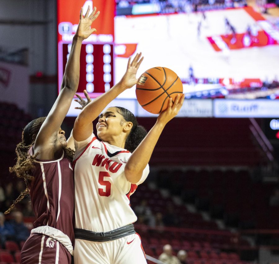 WKU sophomore guard Mya Meredith (5) attempts a two-pointer during the matchup with Little Rock in E.A. Diddle Arena on Sunday, Dec. 11, 2022. WKU won 48-25.