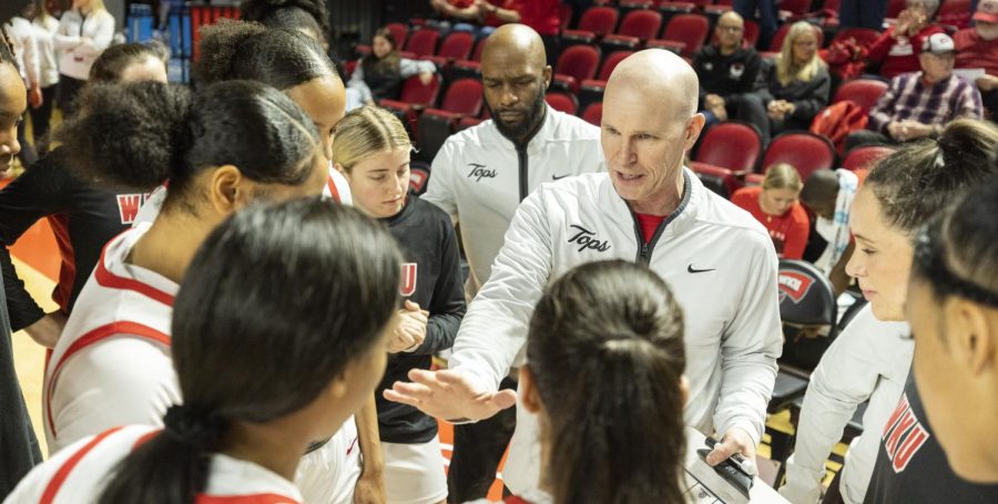 WKU head coach Greg Collins goes over plus with the Lady Toppers ahead of their matchup with UAB in E.A. Diddle Arena on Wednesday, Jan. 11, 2023. WKU won 75-71.