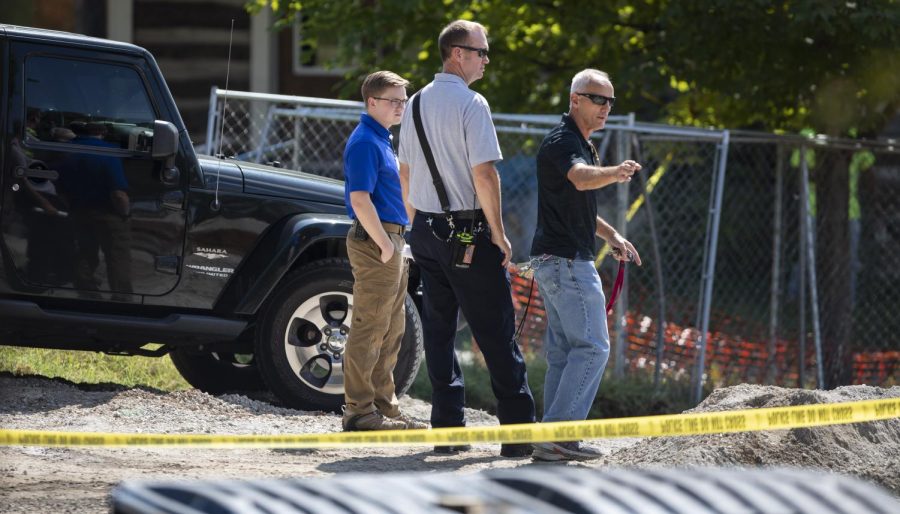 Students and faculty wait outside while WKU Police Department and Bowling Green Fire Department officials respond after a potential explosive device was found near Cherry Hall on WKU's campus in Bowling Green, Ky. on Wednesday, Sept. 14.