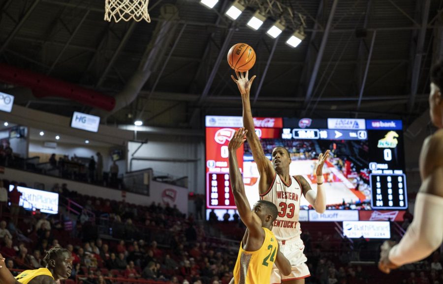 WKU senior center Jamarion Sharp (33) makes a shot during the season opener against Kentucky State University in E.A. Diddle Arena on Saturday, Nov. 12, 2022. WKU won 127-61.