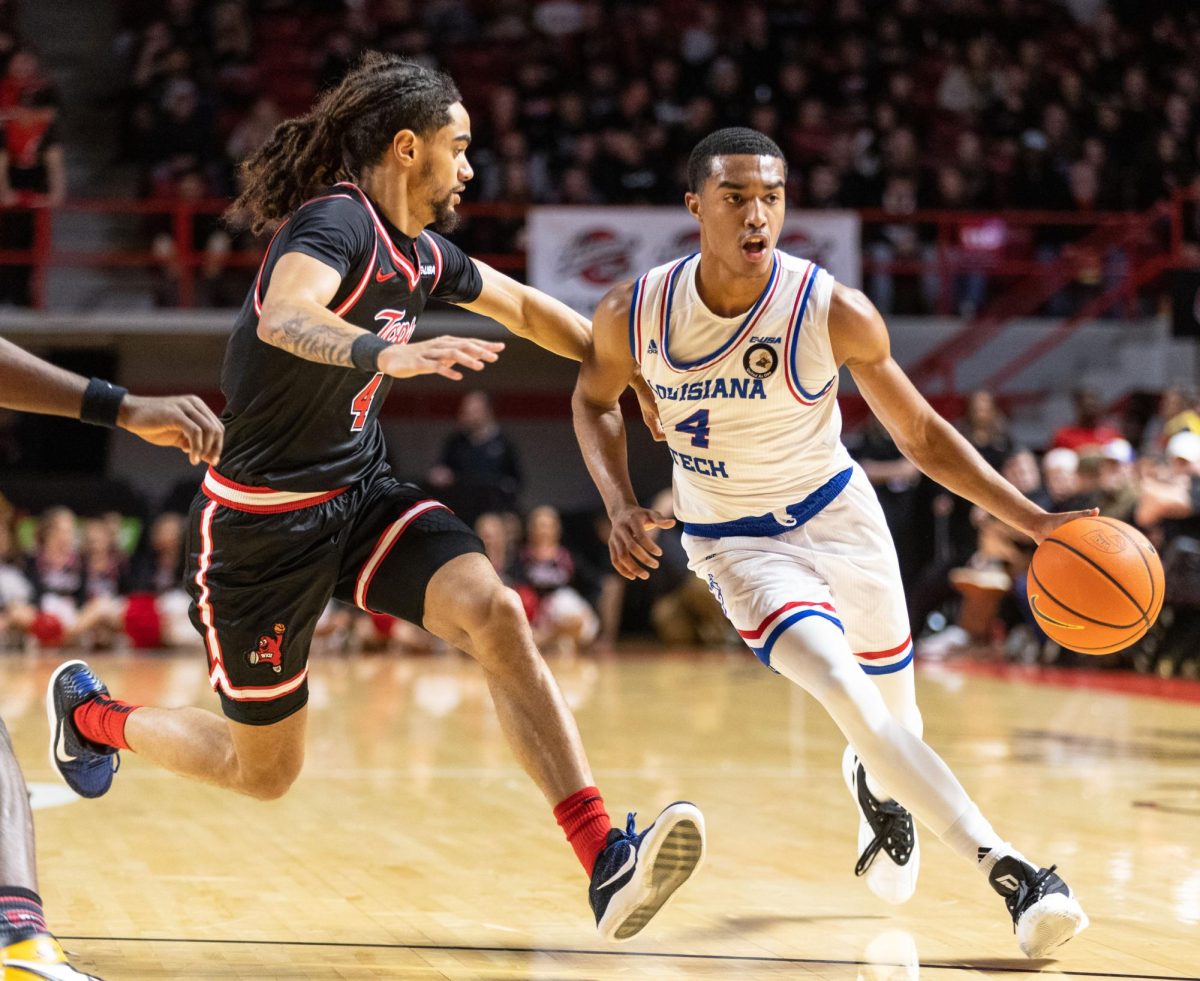 LA Tech's guard Sean Newman Jr. (4) drives the lane during a game against WKU at E.A Diddle Arena on Wednesday, Feb. 28, 2024. 

