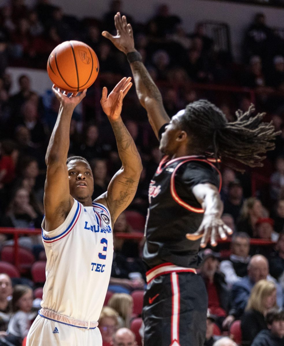 LA Tech's guard Tyler Henry (3) shoots a field goal during a game at E.A Diddle Arena on Wednesday, Feb. 28, 2024. 
