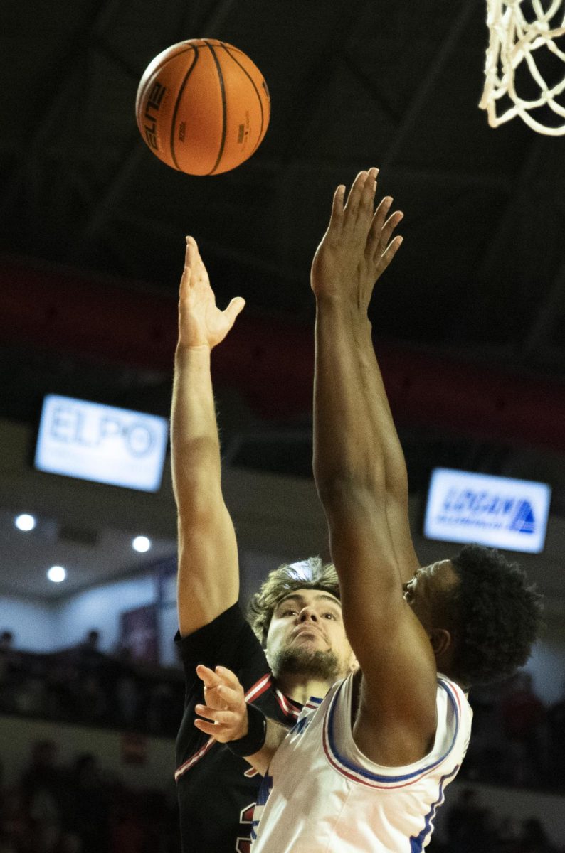 Guard Teagan Moore (30) attempts a layup during WKU's game against LA Tech on Wednesday, Feb. 28, 2024.