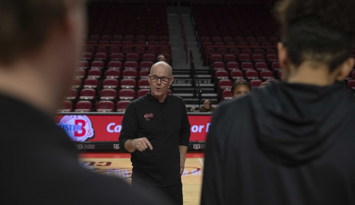 Greg Collins, WKU women's basketball head coach talk with his team after a close loss on Thursday, Jan. 18. 