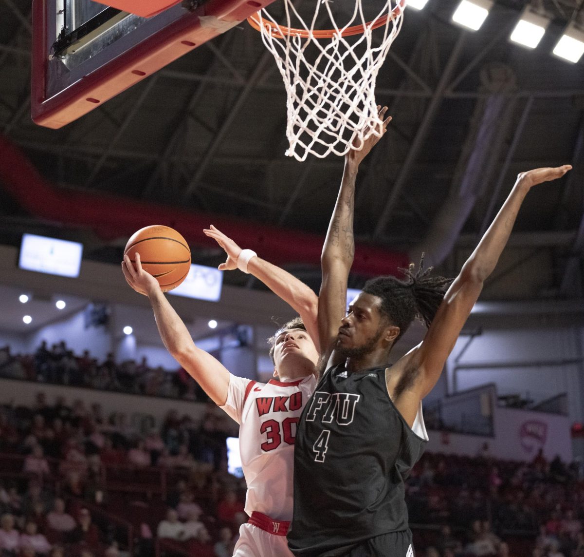 Guard Teagan Moore (30) goes up for a layup during a home game against Florida International University on Thursday, Jan. 25. 
