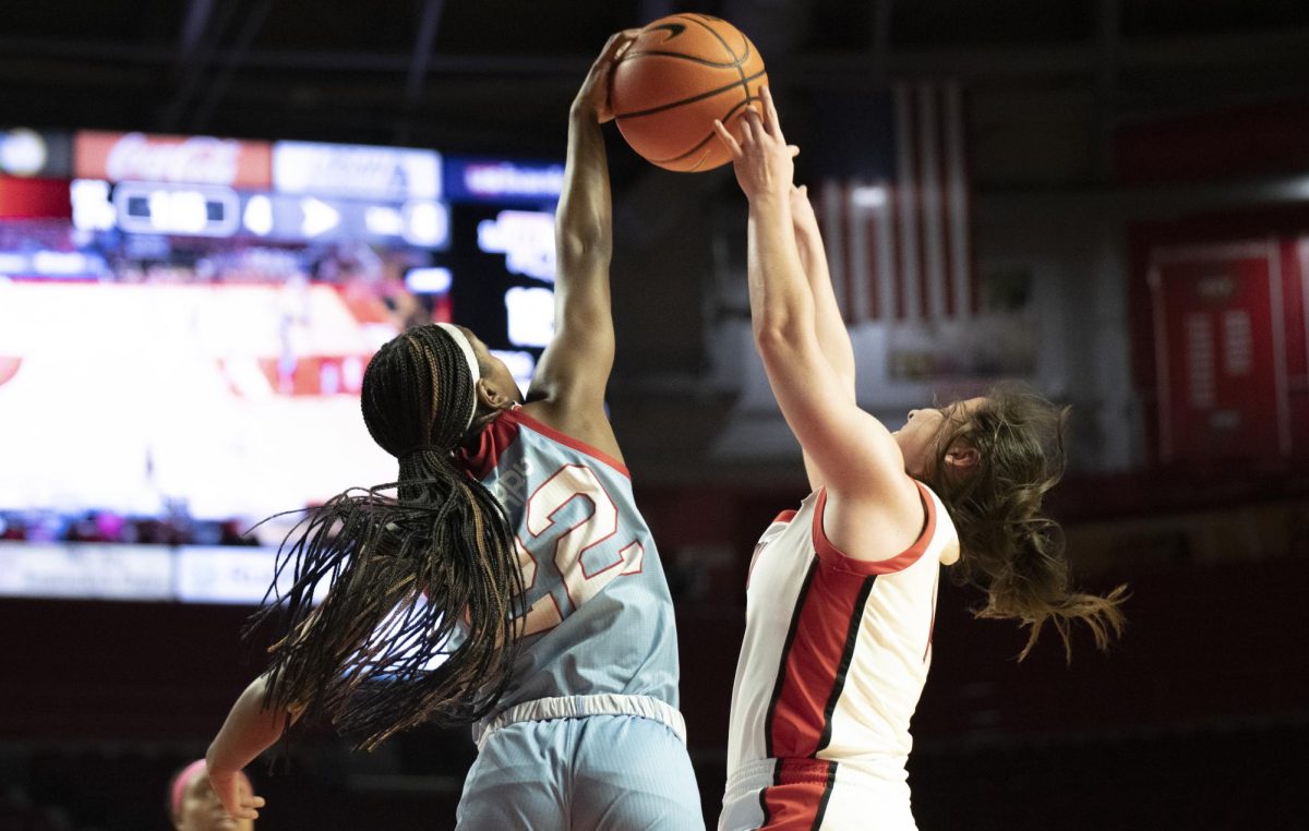 Guard Teresa Faustino (14) battles for the ball during WKU's game against La Tech on Wednesday, Feb. 7. Faustino scored 11 points and WKU won 64-56. 
