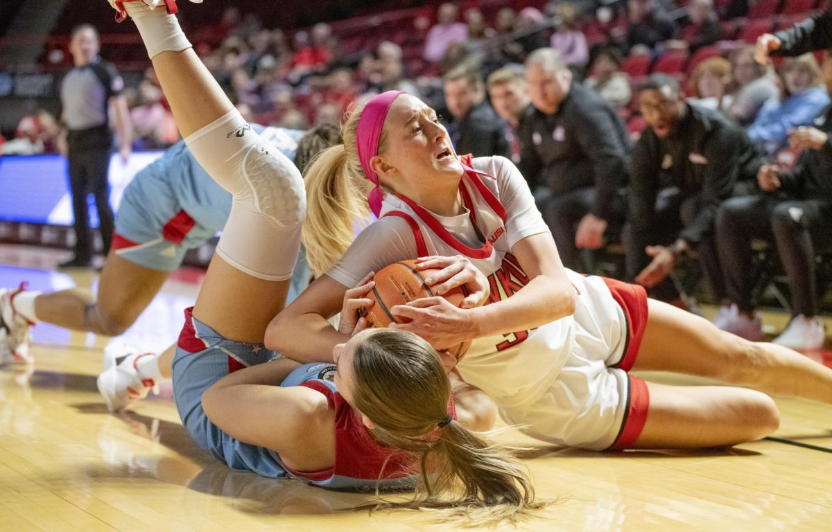 Guard Josie Gilvin (30) wrestles for the ball during the second quarter of WKU's game against La Tech on Wednesday, Feb. 7. 
