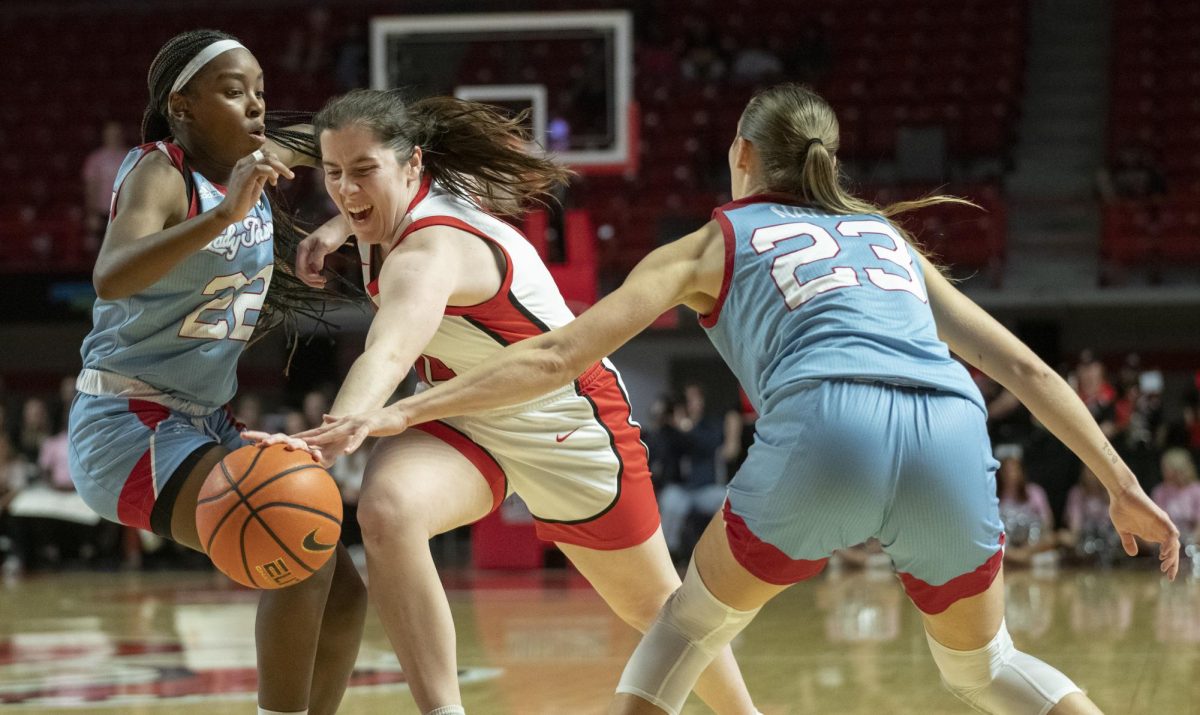 Guard Teresa Faustino (14) drive the lane during WKU's game against La Tech on Wednesday, Feb.7. WKU won 64-56. 