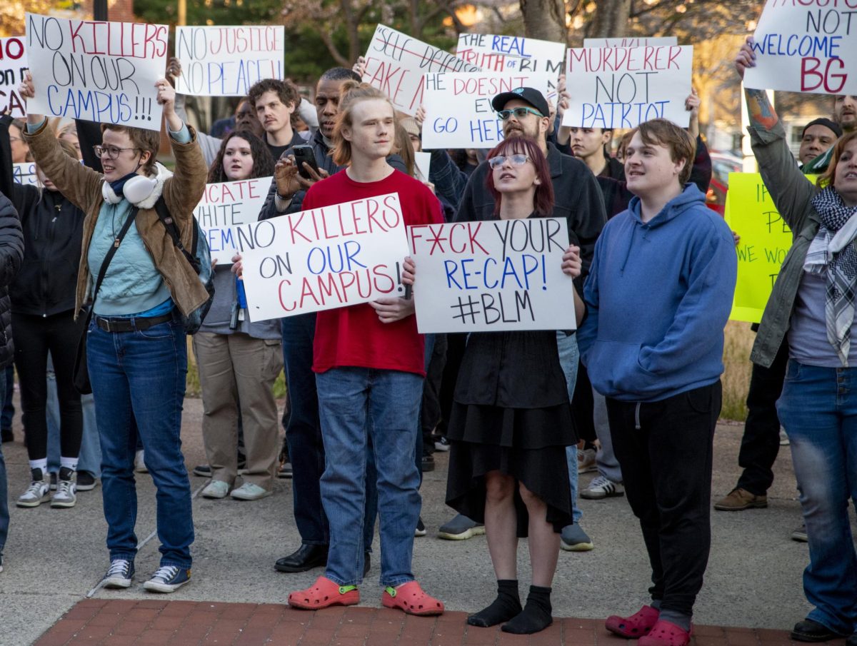 Demonstrators with the BG Freedom Walkers gather outside of the Downing Student Union on Wednesday, March 27, 2024 ahead of the Rittenhouse Recap hosted by WKU's Turning Point USA chapter.