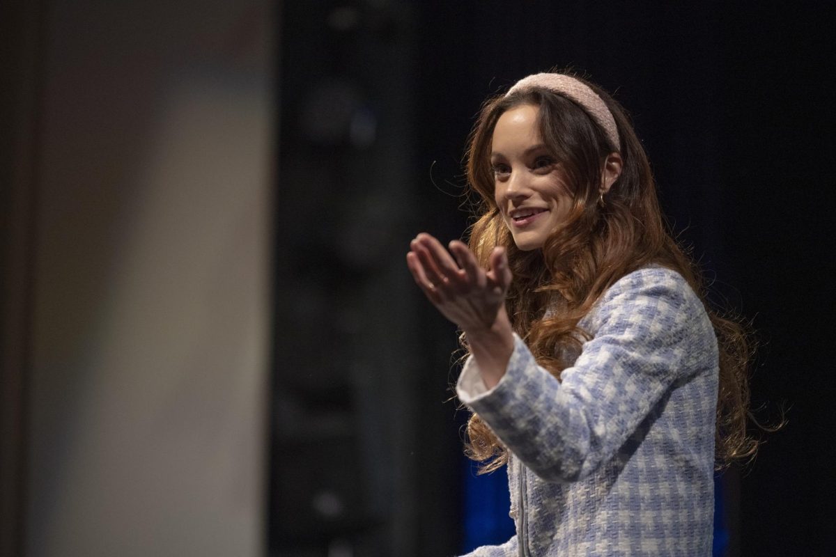 Emily Calandrelli speaks to a crowd of mostly children on Tuesday, Feb. 13. The presentation included information about her career and encouraged students and children to pursue studies and careers in S.T.E.M.