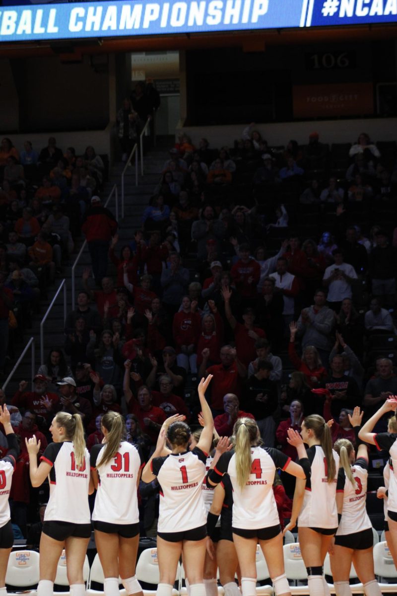 WKU Volleyball waves to fans in Thompson-Boling Arena after defeating Coastal Carolina University in round one of the NCAA Division I Women's Volleyball Championship on Dec. 1, 2023.