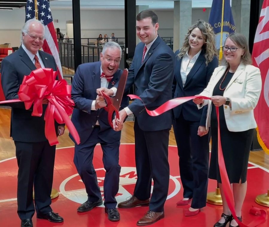 WKU President Timothy Caboni and Student Government Association President Cole Bornefeld cut the ribbon to celebrate the dedication of the Commons at Helm Library on Aug. 31, 2022.