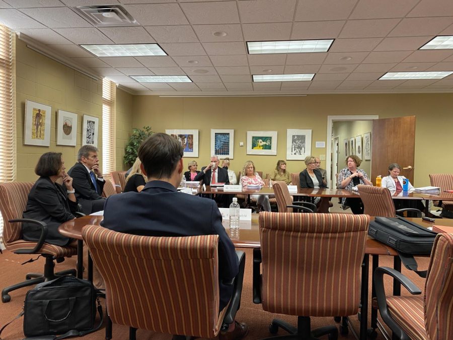 Regents, faculty and university figures wait for the board's final decision on the dismissal of Jeanine Huss in the Wetherby Administration Building on Friday, July 29.