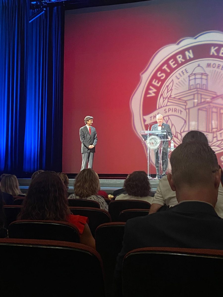 President Timothy Caboni awards the Spirit of WKU award at the 2023-2024 faculty and staff convocation.