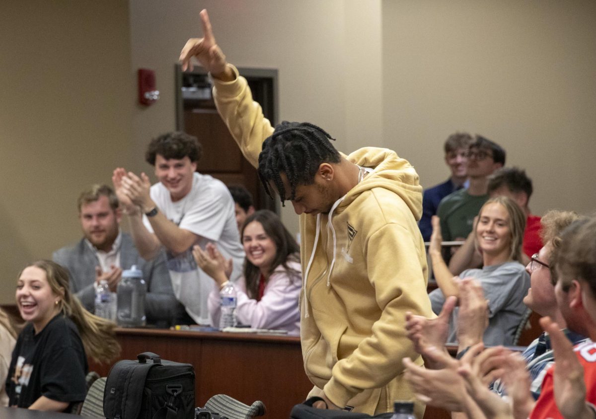 Students cheer for Senator at Large Jaden Marshall after being announced as the Intercultural Student Engagement Center Senator for the 24th Senate on Wednesday, April 17 in the Senate Chamber in DSU. "I've done everything in my power, I've said it 100 times, to be for the students," Marshall said. "So, not only to win, but to hear that reaction for me by the other students is just something that shows people actually care about me [and] really support me."