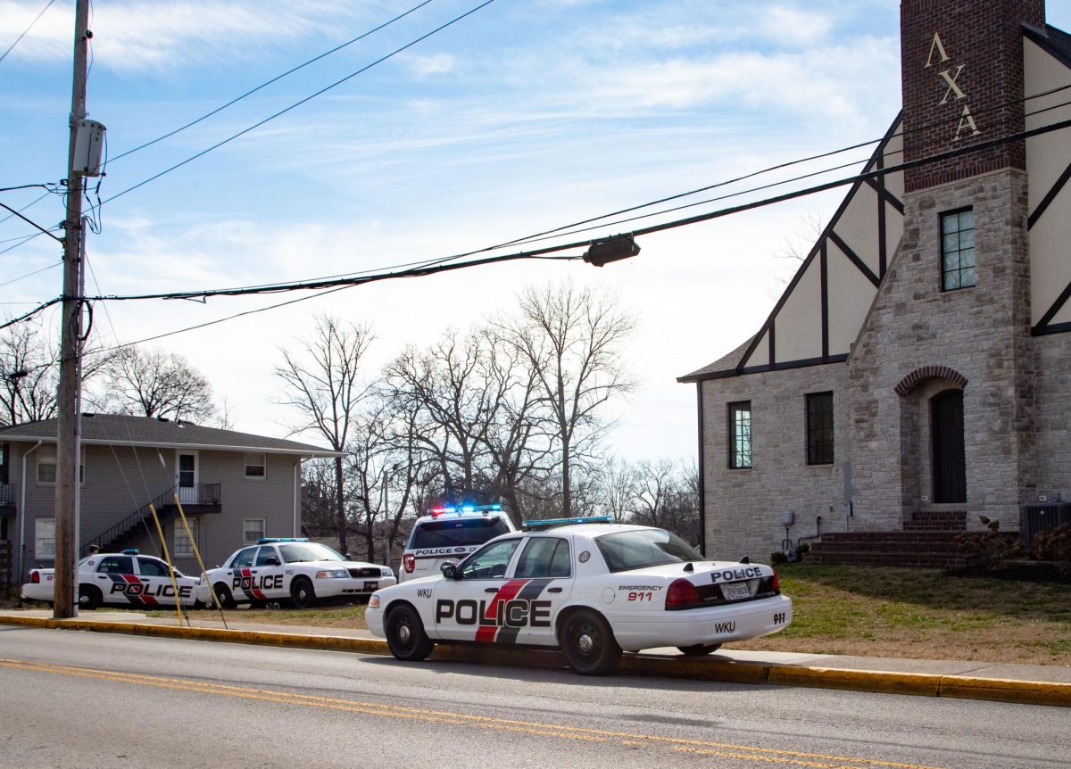 Police are seen outside the Lambda Chi Alpha house adjacent to WKU’s campus on Wednesday, Feb. 7. 