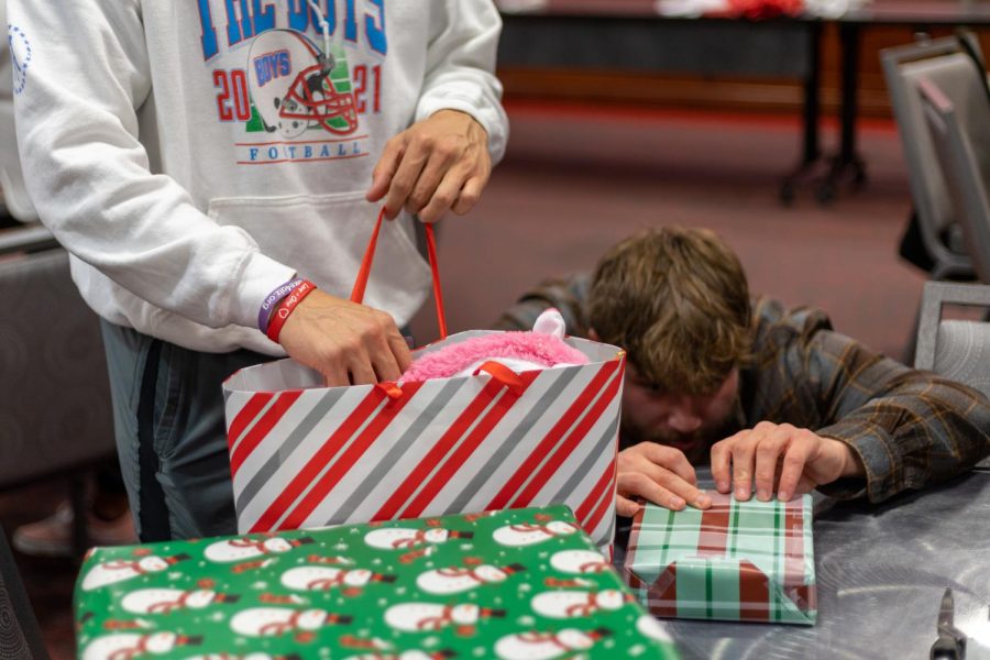 Members of WKU greek life participate in the Greek Christmas Angel event inside Downing Student Union on Tuesday, Nov. 29, 2022.