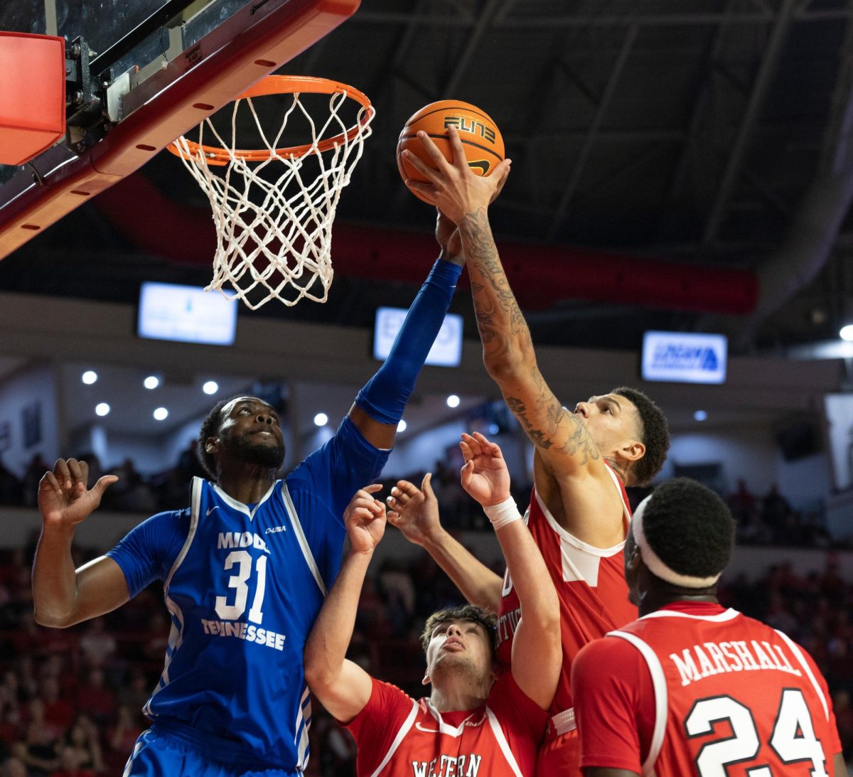 Forward Rodney Howard, right, goes up for a layup in the Diddle arena on Saturday, Feb 3. WKU won 88-65.