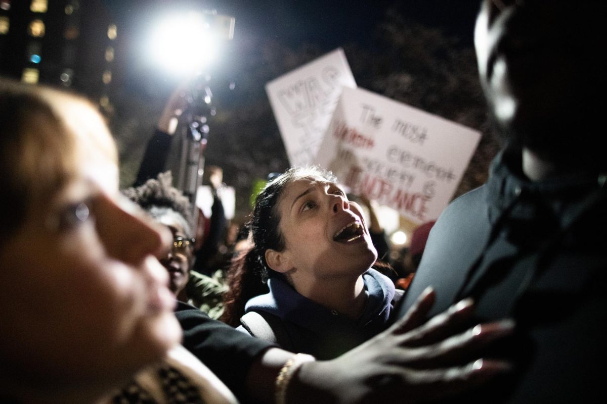President of Bowling Green Freedom Walkers Summer Shannon protest group attempt to restrain protestor Kelly Benton from engaging with Kyle Rittenhouse supporters outside the “Rittenhouse Recap” event at the Downing Student Union on March 27, 2024.
