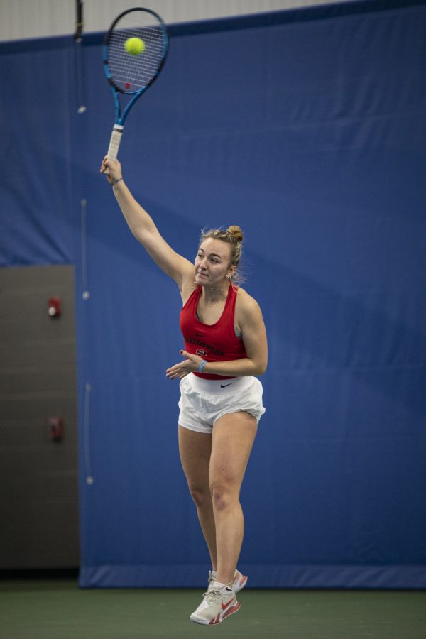 Western Kentucky University Hilltopper Rachel Hermanova serves the ball to Indiana University–Purdue University Indianapolis Jaguars senior Samantha Hayward on the afternoon of Sunday, Feb. 6, 2022, at Michael O. Buchanon Park’s tennis facility. WKU won the match 7-0.