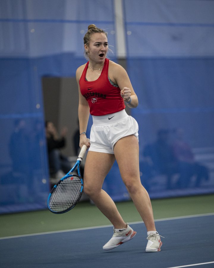 Western Kentucky University Hilltoppers freshman Rachel Hermanova celebrates a point against Indiana University–Purdue University Indianapolis Jaguars senior Samantha Hayward on the afternoon of Sunday, Feb. 6, 2022, at Michael O. Buchanon Park’s tennis facility. WKU won the match 7-0.