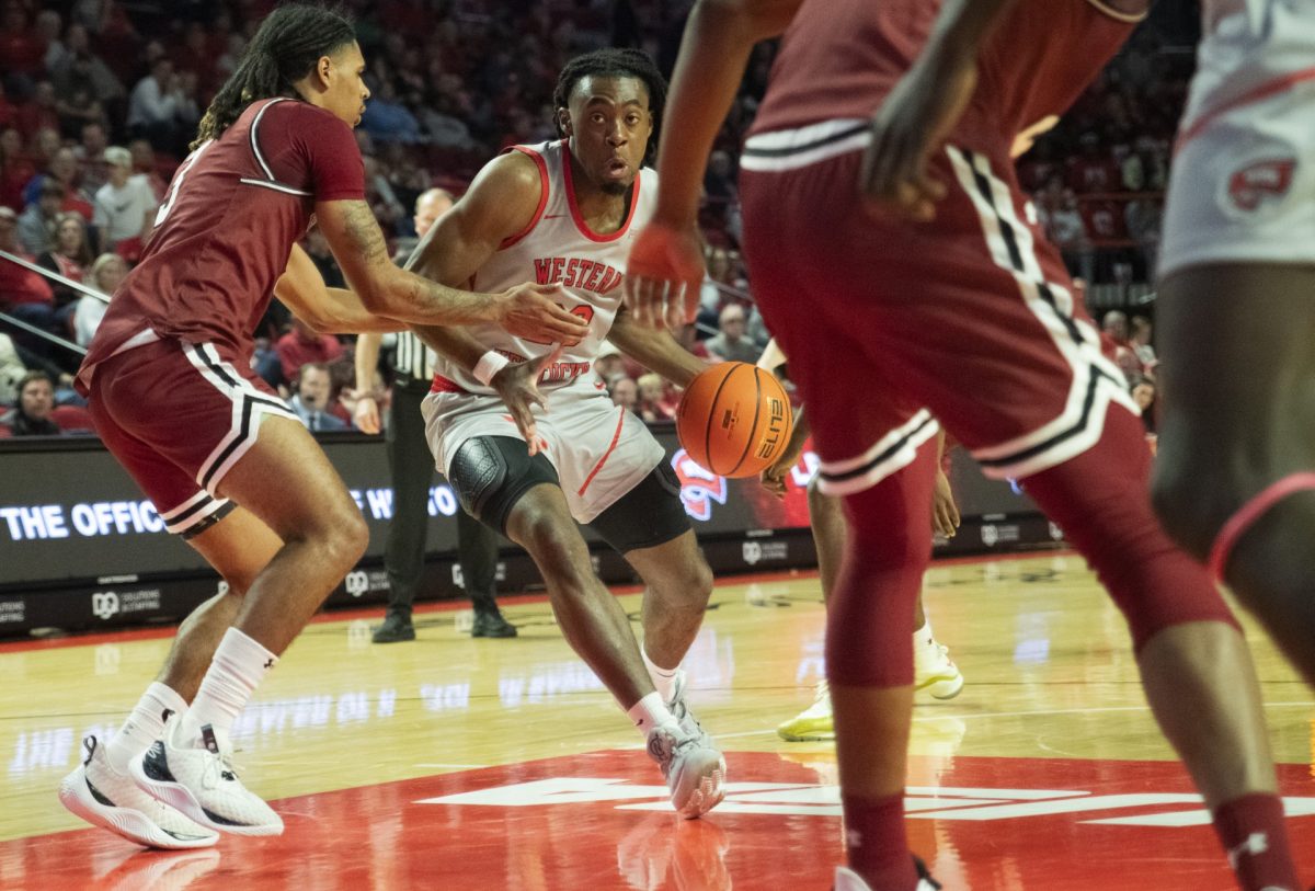 Junior guard Enoch Kalambay driving into the lane in WKU's 72-58 win against New Mexico State.