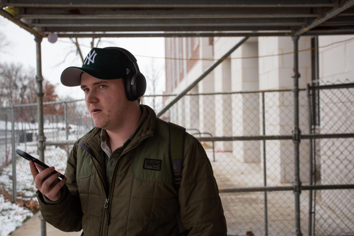Captain of the WKU E-Sports Team Ethan Callister calls his parents outside of Hilltopper Hall on Thursday, Jan. 18. Callister and other hall residents are required to find other housing accommodations after being informed that they are required to move out by Feb. 4.