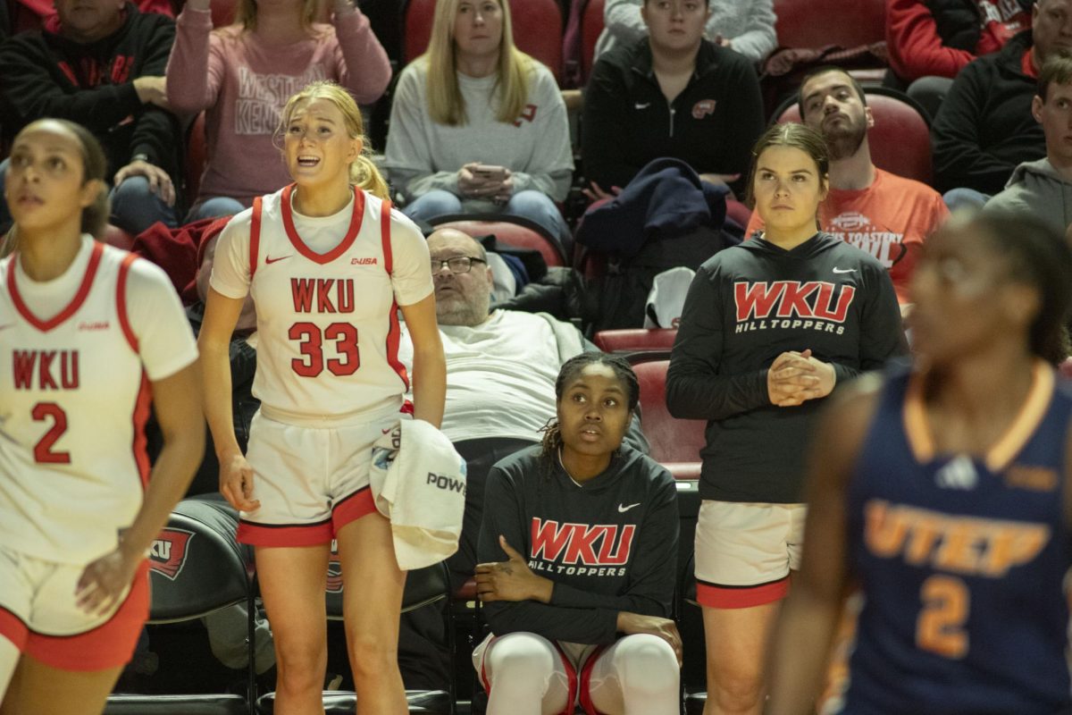 In the final minutes of the tight scoring game, WKU players and fans intently watch WKU drive against UTEP in E.A. Diddle Arena on Saturday, Jan. 20, 2024.