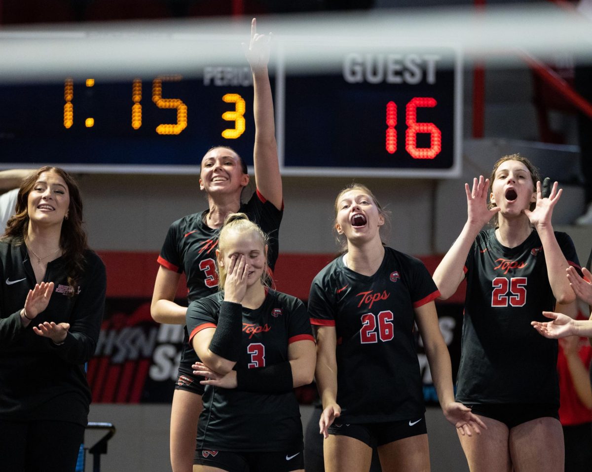 The women’s volleyball team celebrates after a point is scored during a match against Florida International University at the E.A. Diddle Arena in Bowling Green on Saturday, Nov. 4, 2023. 