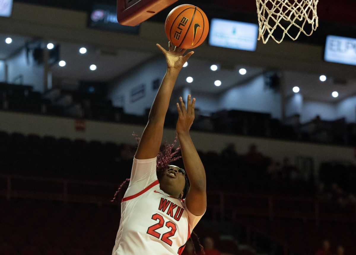 Forward Caitlin Staley (22) goes up for a layup during a game against the Mercer Bears in the Diddle arena on Monday, Nov. 6, 2023.