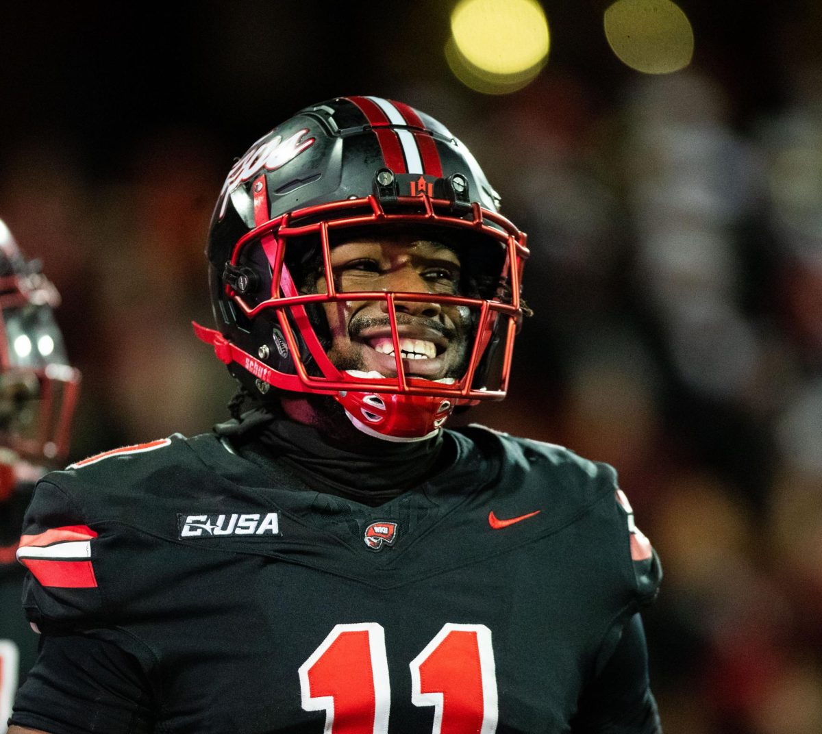 Wide receiver Malachi Corley smiles after his touchdown during a game against Sam Houston State University at L.T Smith Stadium in Bowling Green on Saturday, Nov. 18, 2023.