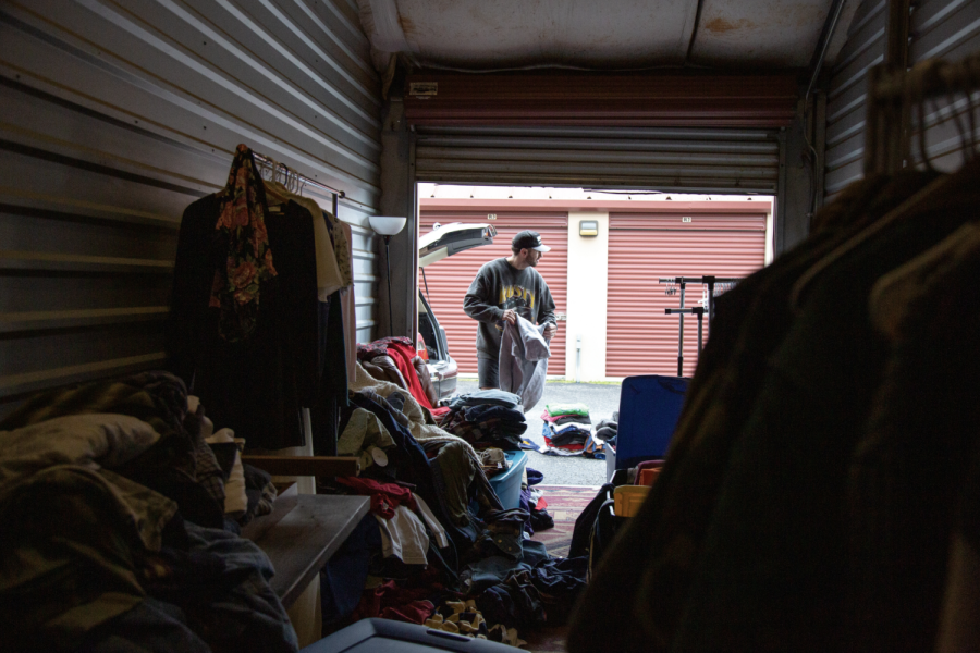 Gatlin Milam buys clothes from a business partner for his store. Milam works full time to stock and build his business, using Instagram and TikTok to help advertise his hauls.
